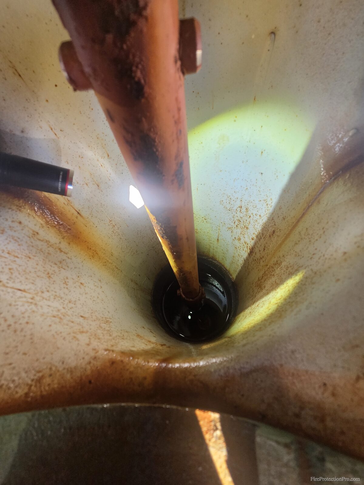 Internal pipe inspection showing corrosion and sediment buildup